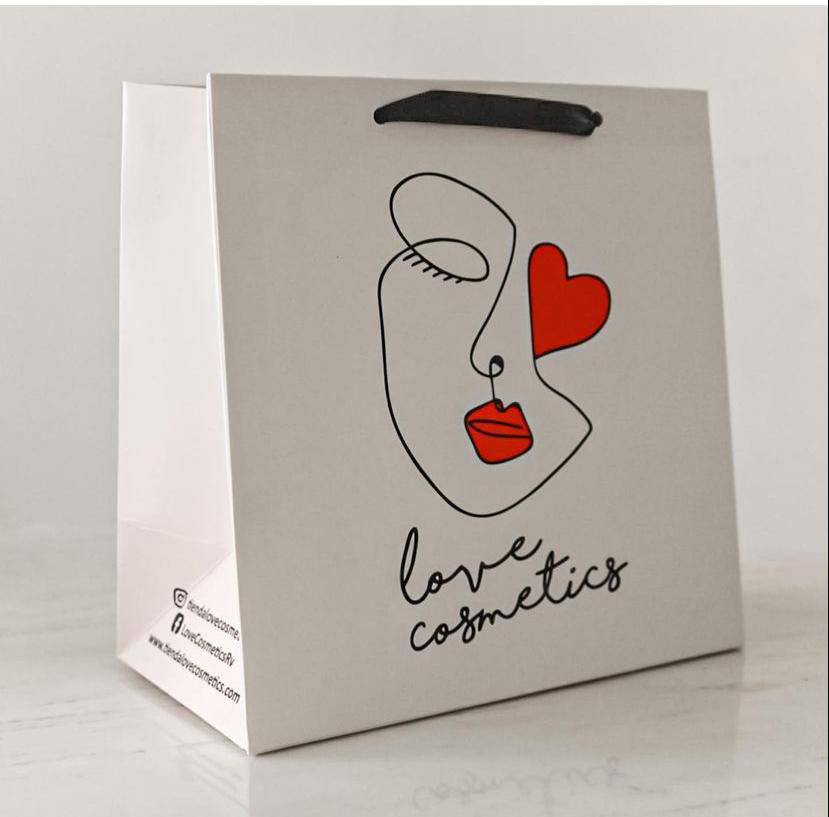 Bolsa de papel para cosméticos con impresión artística y asas de cordón